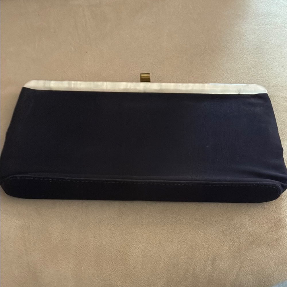 Vintage navy clutch with pearl colored detail